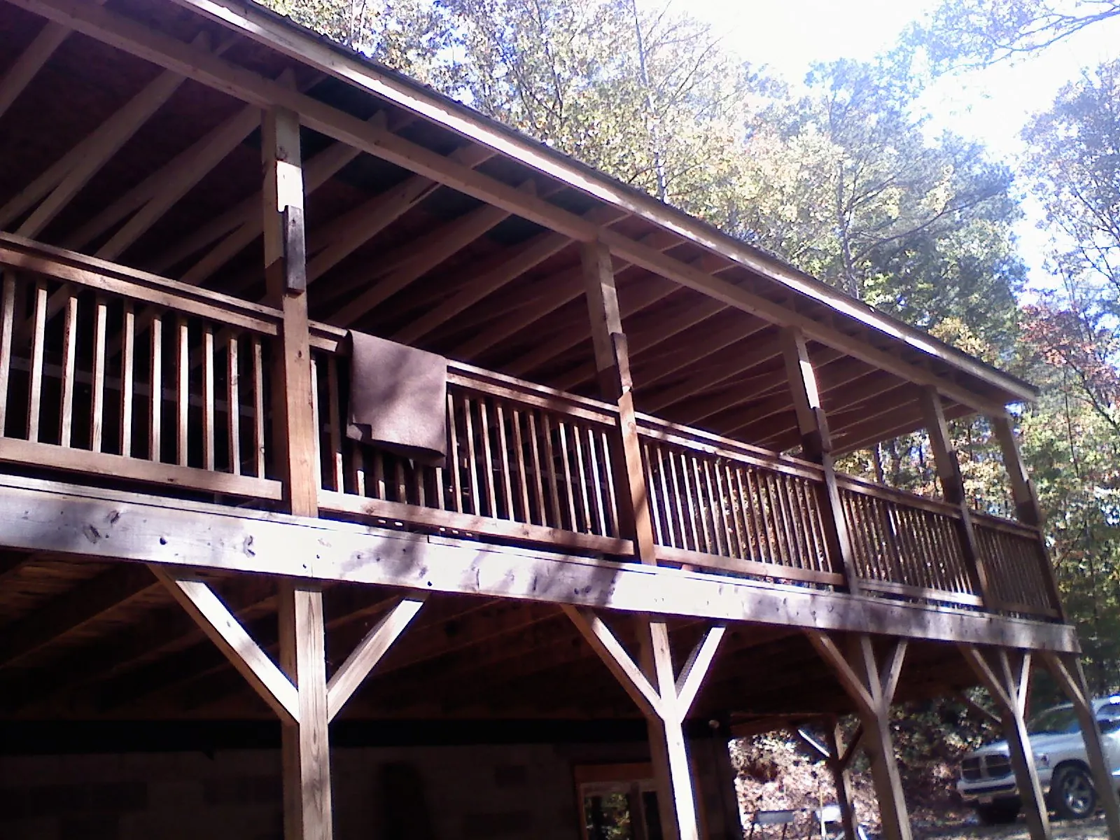 Timber framing under a new elevated porch and deck — Roof Leak Repair in Rockwell City by Roofing Brothers